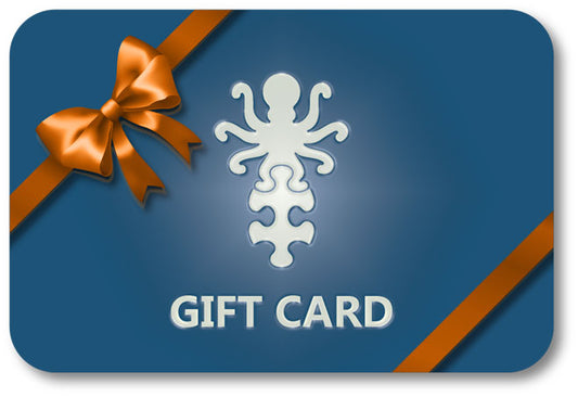 Fathom Puzzles logo on a gift card for wooden jigsaw puzzle with orange bow