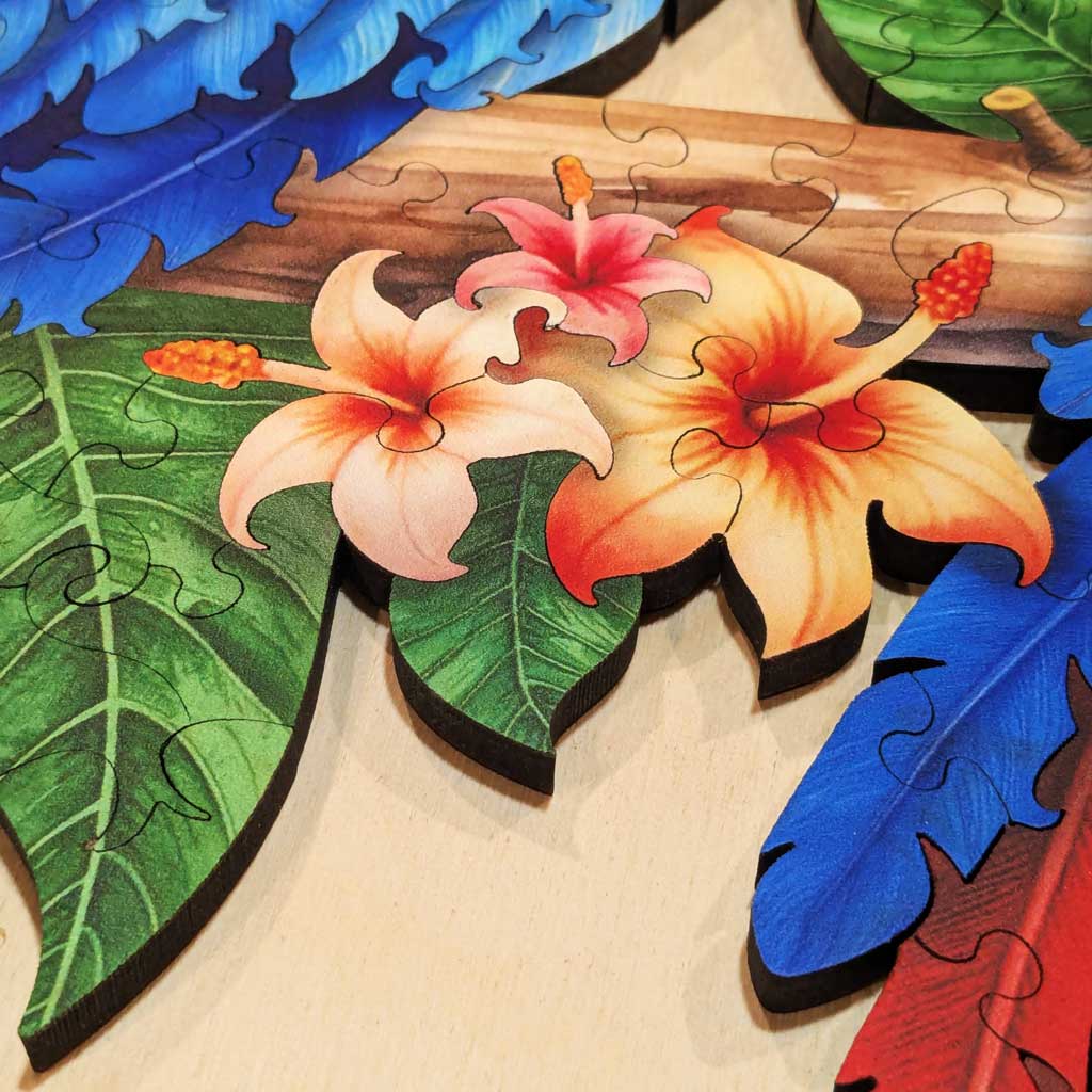 Bright tropical flower puzzle pieces with clean wooden edges