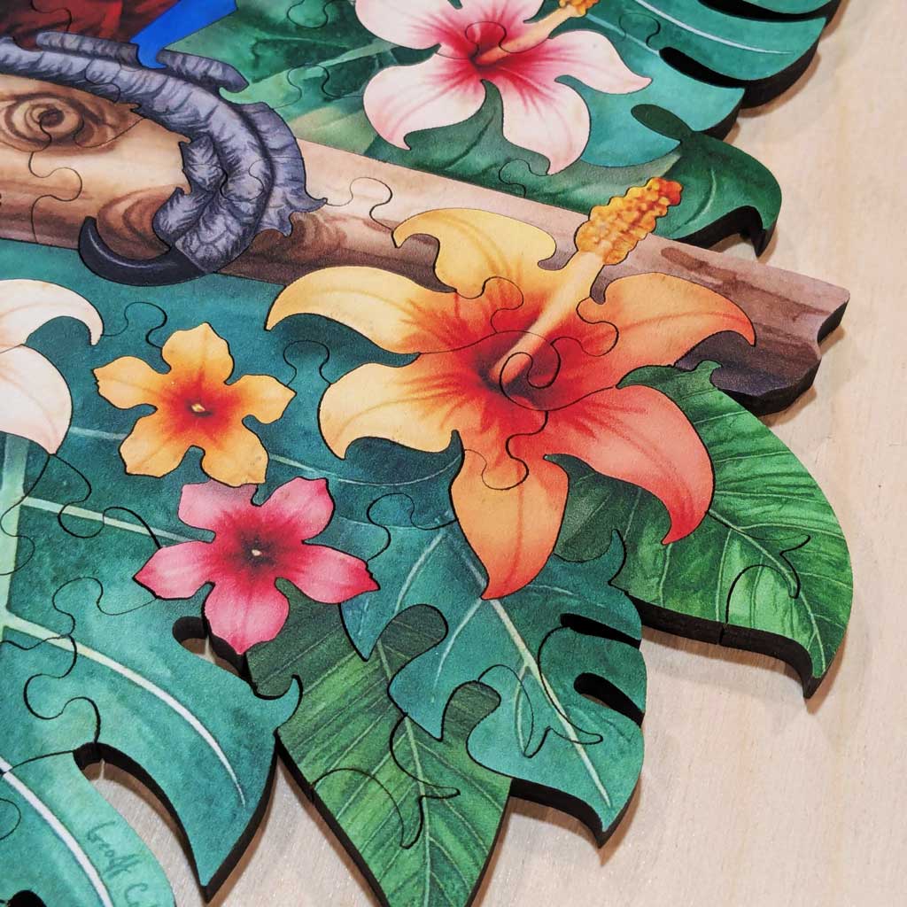 Bright orange and pink hibiscus flower pieces from wooden puzzle