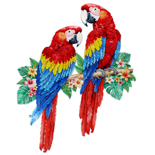 Completed wooden puzzle of two scarlet macaws with tropical flowers