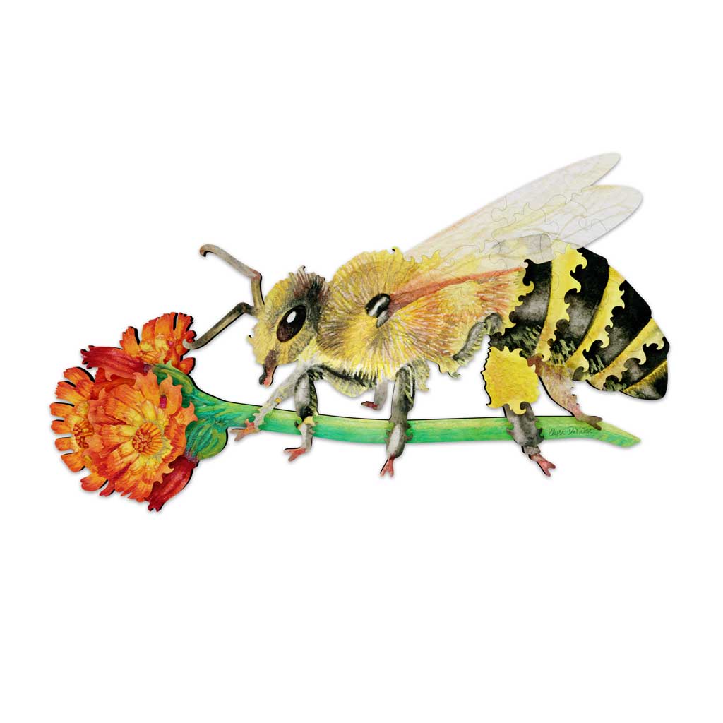 Completed wooden jigsaw puzzle of a honey bee on an orange marigold flower, showing the intricate precision-cut details and realistic hand-painted design.