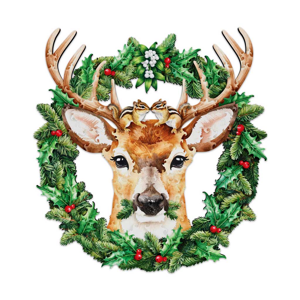 Finished “Under the Mistletoe” puzzle showing a deer nibbling a Christmas wreath while two chipmunks kiss between its antlers.